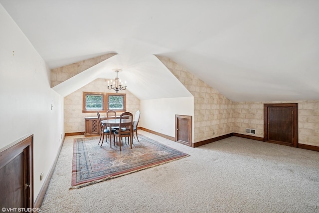 691 Lake Ave, Crystal Lake, IL 60014 - additional living space featuring carpet, a chandelier, and vaulted ceiling