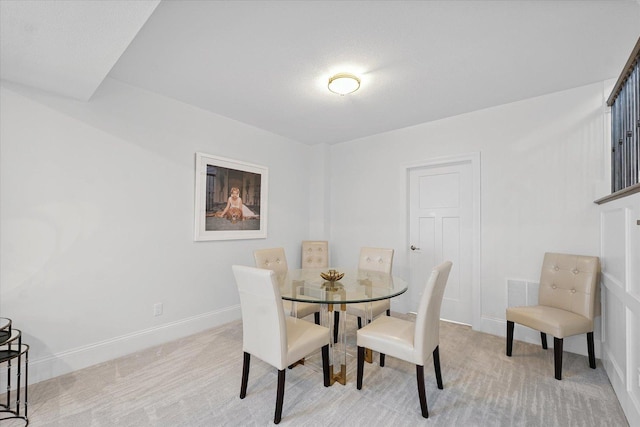 1311 Hickory Tree Ct, Mahomet, IL 61853 - dining space featuring baseboards and light carpet