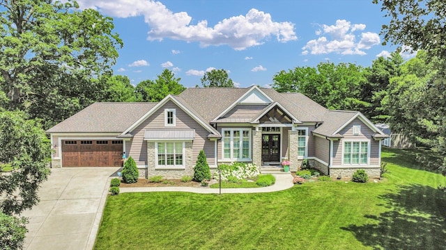 1311 Hickory Tree Ct, Mahomet, IL 61853 - craftsman house featuring stone siding, concrete driveway, a front yard, and a garage