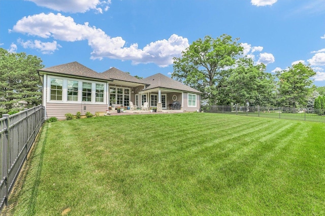 1311 Hickory Tree Ct, Mahomet, IL 61853 - rear view of property featuring a patio area and a fenced backyard
