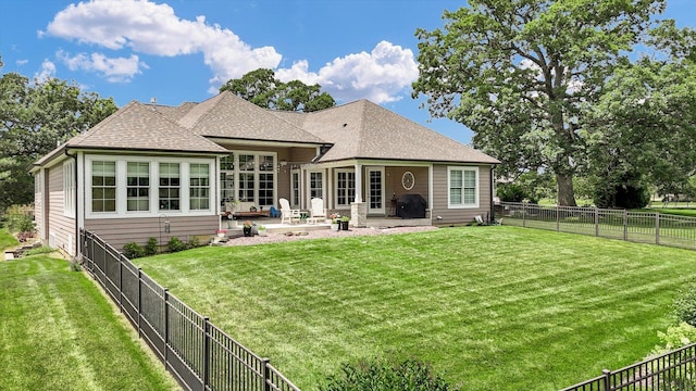 1311 Hickory Tree Ct, Mahomet, IL 61853 - back of property with a patio area, a shingled roof, and a fenced backyard