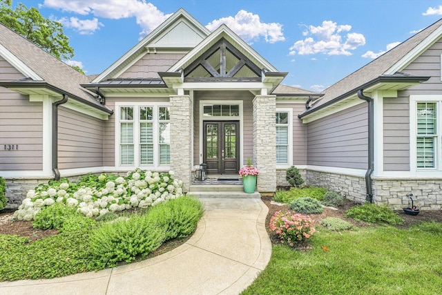 1311 Hickory Tree Ct, Mahomet, IL 61853 - doorway to property with french doors and stone siding