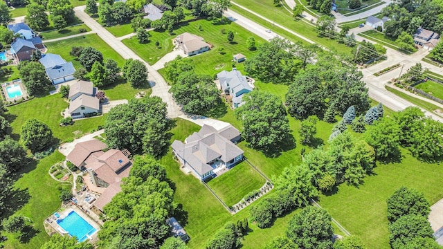 1311 Hickory Tree Ct, Mahomet, IL 61853 - aerial perspective of suburban area featuring a pool