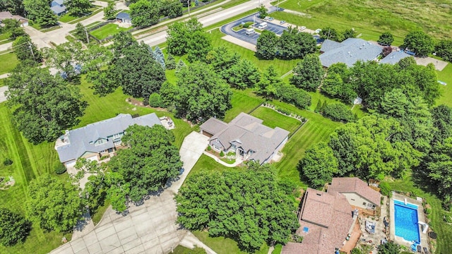 1311 Hickory Tree Ct, Mahomet, IL 61853 - aerial view of residential area featuring a pool area