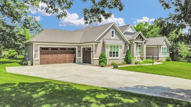 1311 Hickory Tree Ct, Mahomet, IL 61853 - craftsman-style house with stone siding, an attached garage, driveway, a front yard, and roof with shingles