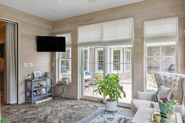 1311 Hickory Tree Ct, Mahomet, IL 61853 - living room with wood walls