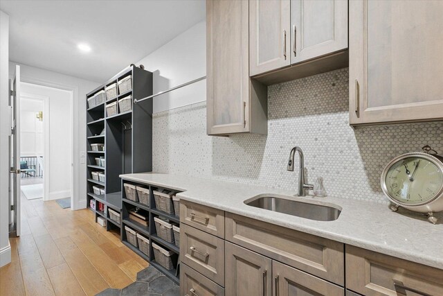 1311 Hickory Tree Ct, Mahomet, IL 61853 - kitchen with light wood-style floors and decorative backsplash