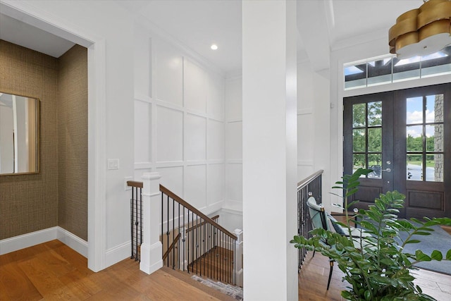 1311 Hickory Tree Ct, Mahomet, IL 61853 - stairs with wood finished floors, french doors, and recessed lighting