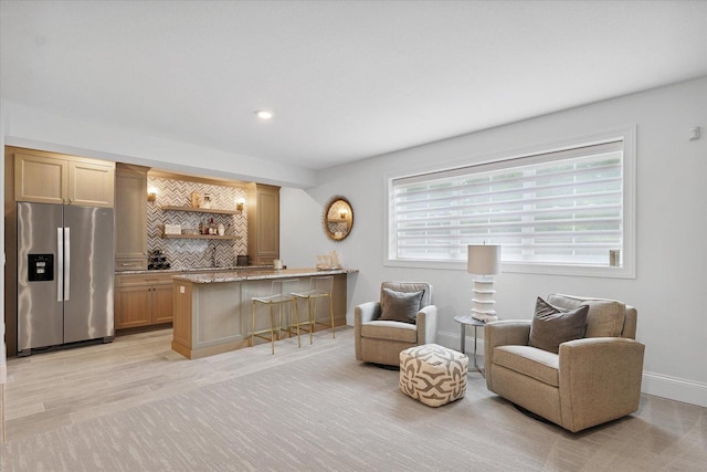 1311 Hickory Tree Ct, Mahomet, IL 61853 - sitting room featuring bar with sink and recessed lighting