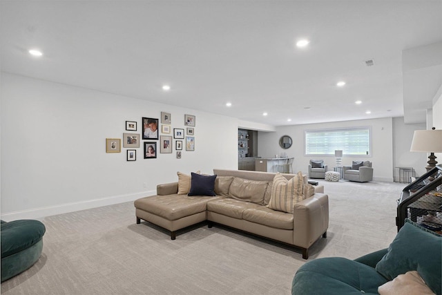 1311 Hickory Tree Ct, Mahomet, IL 61853 - living area featuring light carpet, recessed lighting, and bar