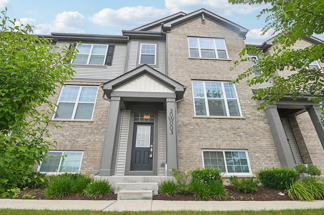 30W003 Brayman Ct, Warrenville, IL 60563 - view of front facade with brick siding