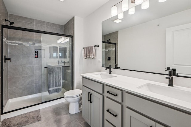 30W003 Brayman Ct, Warrenville, IL 60563 - bathroom featuring double vanity, tile patterned floors, and a stall shower