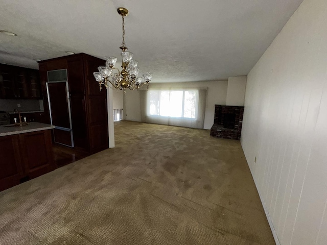 400 N Cottage Ave, Normal, IL 61761 - unfurnished dining area with a chandelier, carpet, and a fireplace