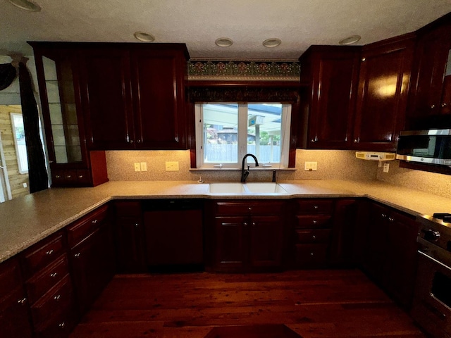 400 N Cottage Ave, Normal, IL 61761 - kitchen with stainless steel microwave, dishwasher, and reddish brown cabinets