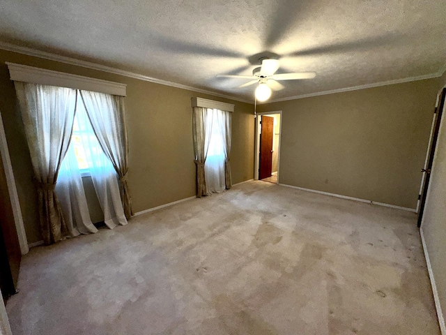 400 N Cottage Ave, Normal, IL 61761 - empty room featuring ceiling fan, ornamental molding, light colored carpet, and a textured ceiling