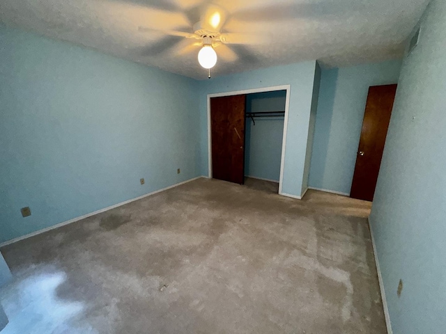 400 N Cottage Ave, Normal, IL 61761 - unfurnished bedroom featuring a closet, a ceiling fan, and carpet floors
