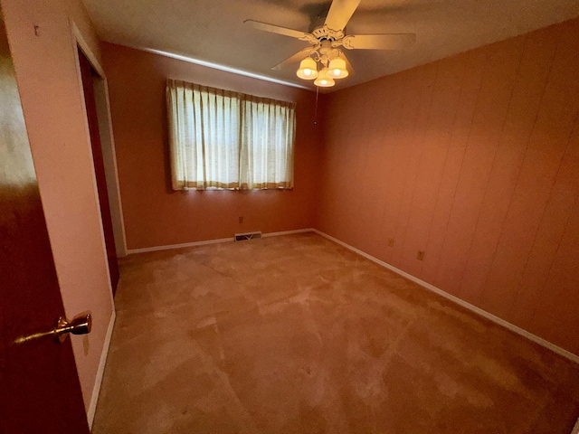 400 N Cottage Ave, Normal, IL 61761 - spare room with carpet and a ceiling fan