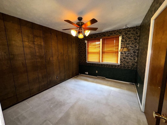 400 N Cottage Ave, Normal, IL 61761 - spare room with a ceiling fan and carpet flooring