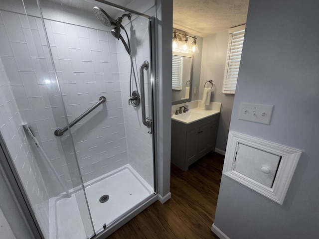 400 N Cottage Ave, Normal, IL 61761 - bathroom with a shower stall, wood finished floors, and vanity