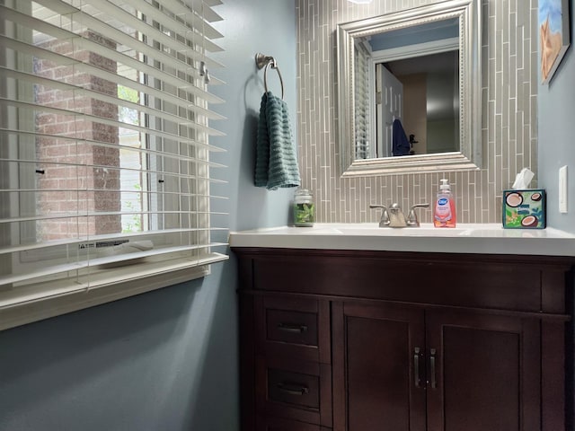 543 Norman Rd Unit 543, Bolingbrook, IL 60440 - bathroom with vanity and tasteful backsplash