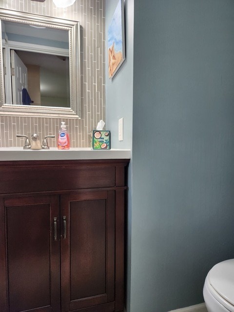 543 Norman Rd Unit 543, Bolingbrook, IL 60440 - bathroom featuring vanity and decorative backsplash