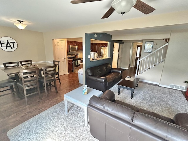 543 Norman Rd Unit 543, Bolingbrook, IL 60440 - living area featuring stairs, ceiling fan, and dark wood-style floors