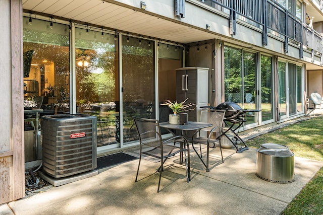 1811 Four Lakes Ave Unit 1H, Lisle, IL 60532 - view of patio featuring a grill