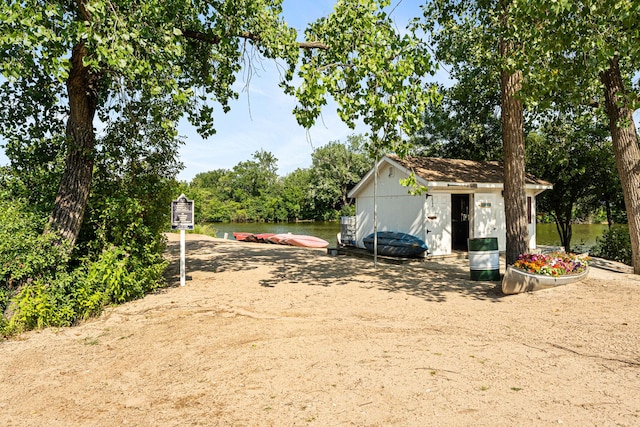 1811 Four Lakes Ave Unit 1H, Lisle, IL 60532 - view of yard with a dock and a water view