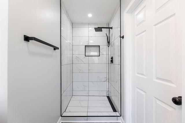 14911 Woodlawn Ave, Dolton, IL 60419 - bathroom with a tile shower and marble look tile flooring