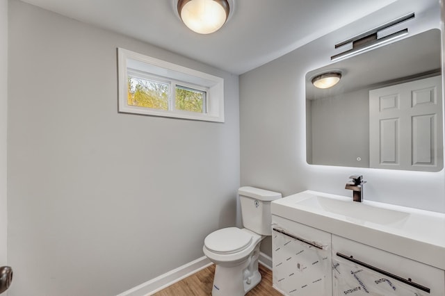 14911 Woodlawn Ave, Dolton, IL 60419 - bathroom featuring wood finished floors and vanity