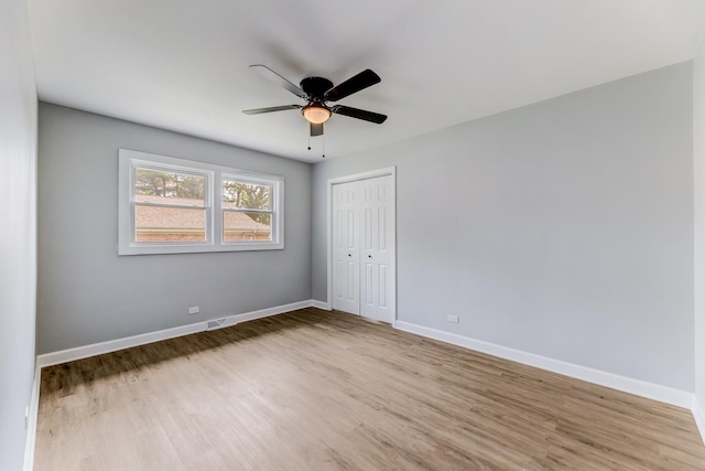 14911 Woodlawn Ave, Dolton, IL 60419 - empty room with wood finished floors and a ceiling fan