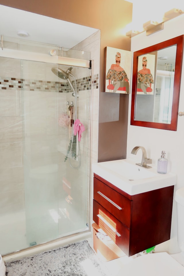 2545 N 72nd Ct Unit 4, Elmwood Park, IL 60707 - bathroom featuring a stall shower and vanity