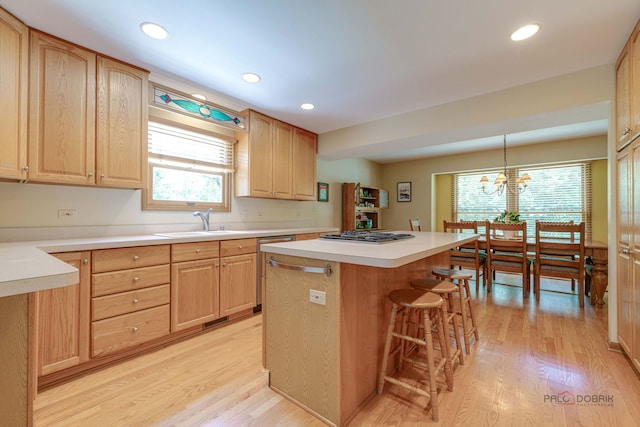 24 Hickory Rd, Oakwood Hills, IL 60013 - kitchen with light brown cabinetry, light wood finished floors, a center island, light countertops, and recessed lighting