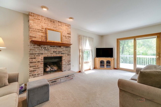 24 Hickory Rd, Oakwood Hills, IL 60013 - living area with a fireplace, healthy amount of natural light, and carpet floors