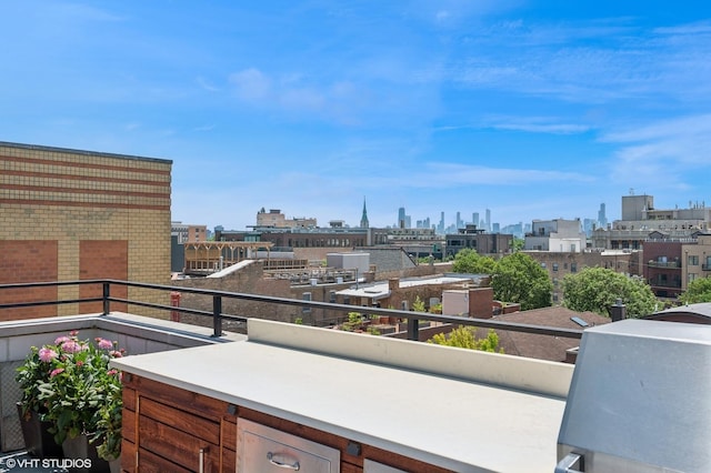 3255 N Paulina St Unit 4A, Chicago, IL 60657 - balcony with a skyline view