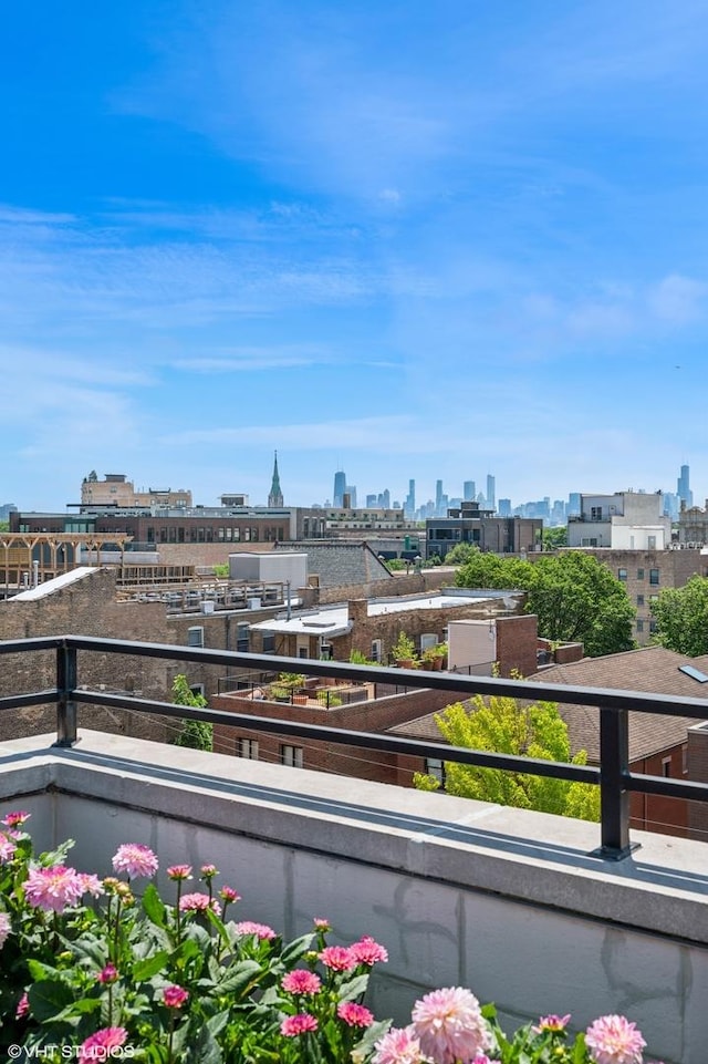 3255 N Paulina St Unit 4A, Chicago, IL 60657 - balcony with a skyline view