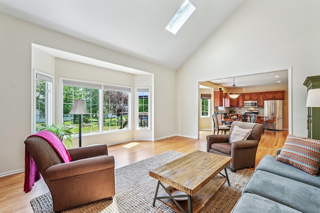 2524 Wild Timothy Rd, Naperville, IL 60564 - living area featuring light wood finished floors, high vaulted ceiling, a skylight, and recessed lighting