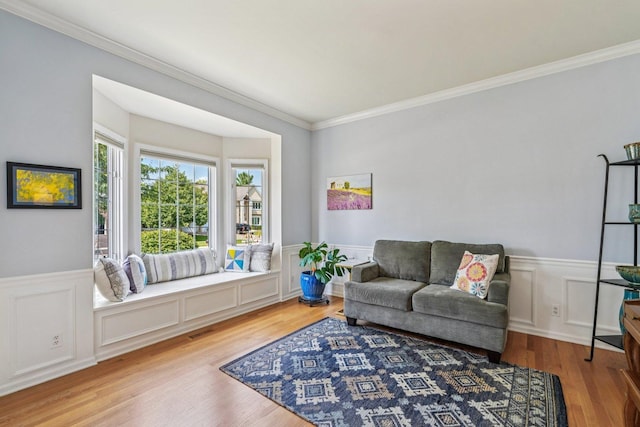 2524 Wild Timothy Rd, Naperville, IL 60564 - living area featuring ornamental molding, wood finished floors, a wainscoted wall, and a decorative wall
