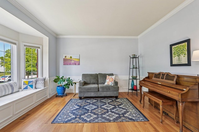 2524 Wild Timothy Rd, Naperville, IL 60564 - living area featuring crown molding, wood finished floors, a decorative wall, and wainscoting
