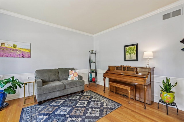 2524 Wild Timothy Rd, Naperville, IL 60564 - living area featuring crown molding, wood finished floors, and wainscoting