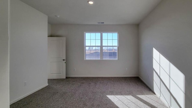 6473 Juniper Dr, Wonder Lake, IL 60097 - spare room featuring carpet floors and baseboards