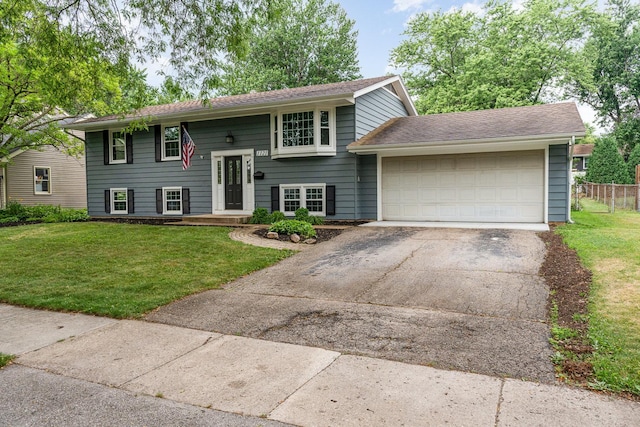 1121 S 13th St, Saint Charles, IL 60174 - raised ranch featuring driveway and a garage