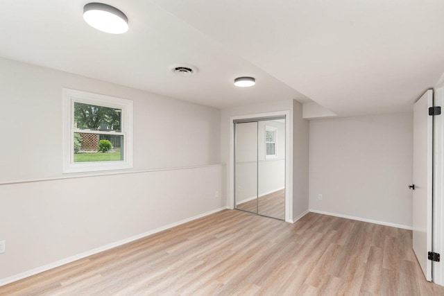 1121 S 13th St, Saint Charles, IL 60174 - unfurnished bedroom with light wood finished floors and a closet