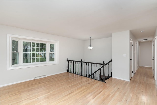1121 S 13th St, Saint Charles, IL 60174 - unfurnished room featuring light wood-style flooring and baseboards