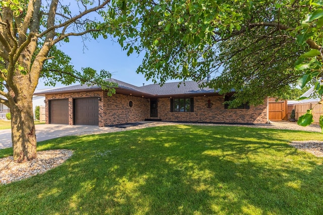 1413 Bethany Ln, Pontiac, IL 61764 - ranch-style house featuring a garage, brick siding, and concrete driveway
