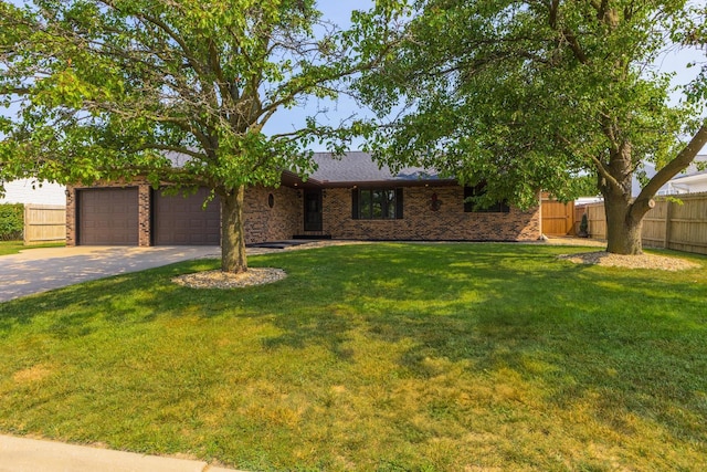 1413 Bethany Ln, Pontiac, IL 61764 - view of front of home with driveway, an attached garage, and brick siding