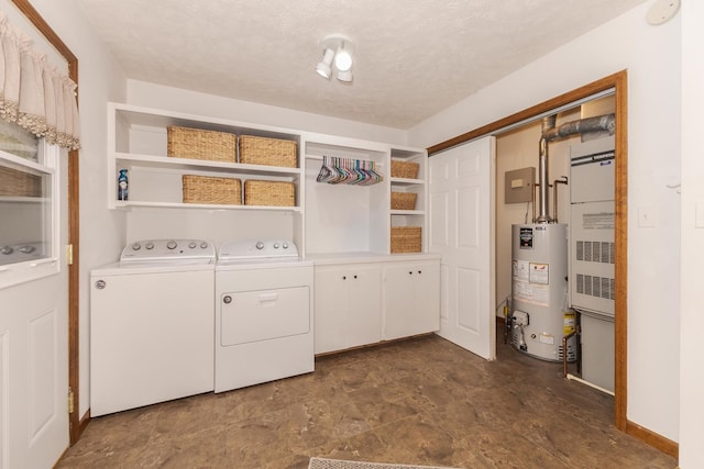 1413 Bethany Ln, Pontiac, IL 61764 - laundry area with water heater, washer and dryer, cabinet space, and a textured ceiling