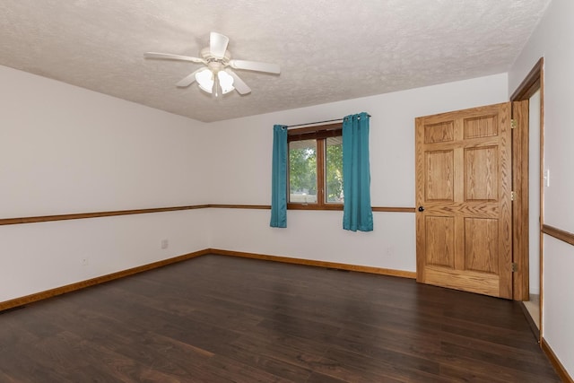 1413 Bethany Ln, Pontiac, IL 61764 - unfurnished room featuring a textured ceiling, dark wood finished floors, and ceiling fan