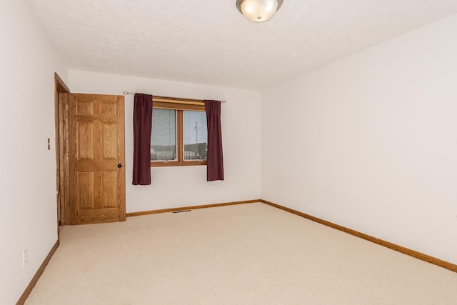1413 Bethany Ln, Pontiac, IL 61764 - carpeted spare room with baseboards