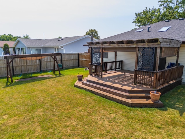 1413 Bethany Ln, Pontiac, IL 61764 - fenced backyard with a deck and a pergola